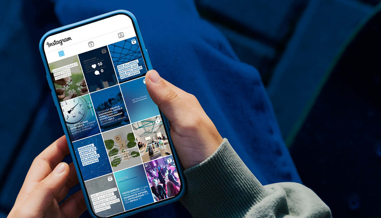 Person mit einem Smartphone auf dem der Instagram-Account vom Alliance-Verband zu sehen ist.